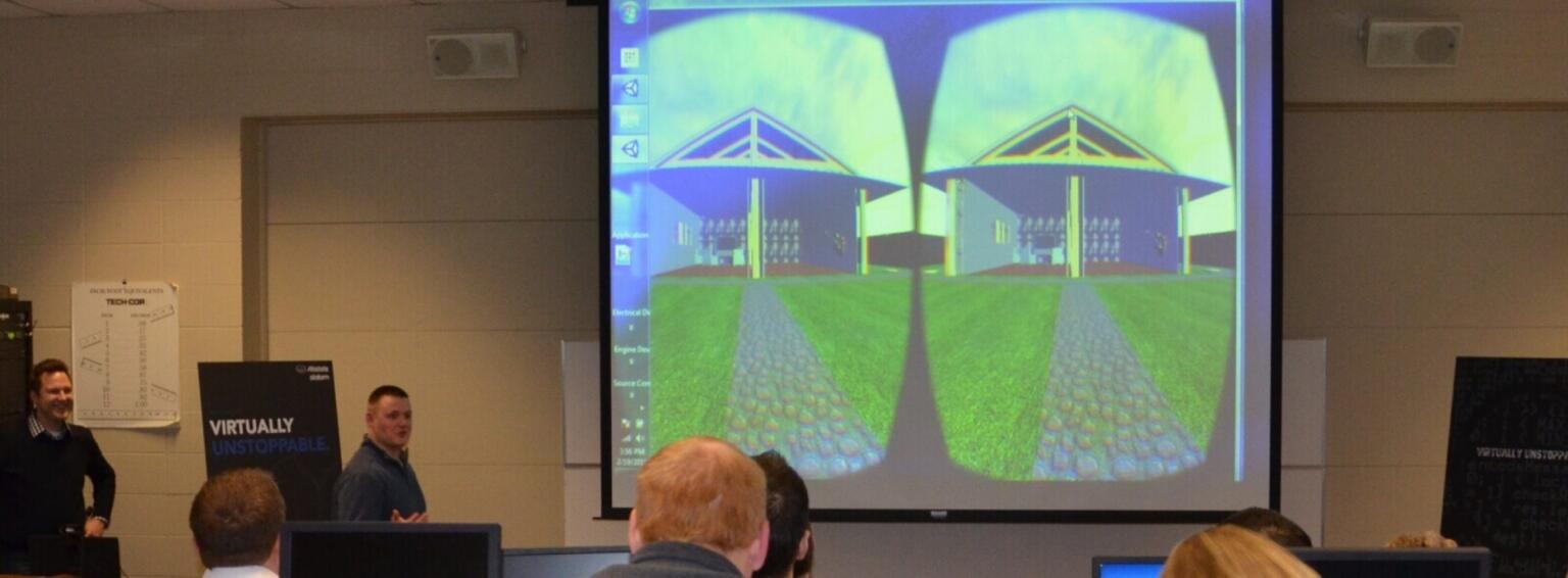 Presentation of binocular VR headset view projected on a drop down screen.