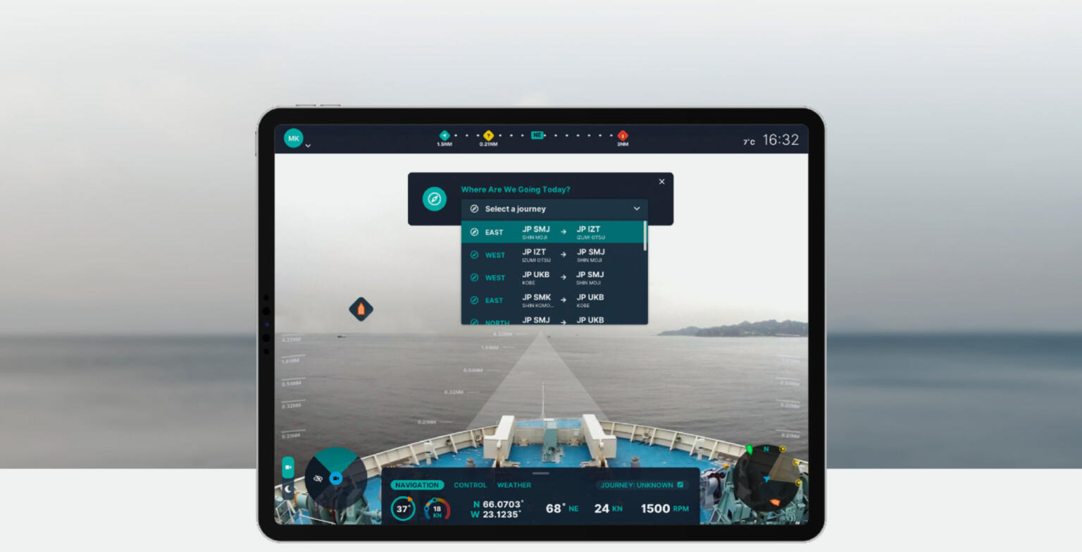 Close up of iPad showing ship navigation screen, over an open waterway.